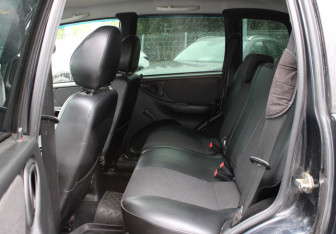 Подержанный автомобиль Chevrolet Niva 2010 года (10 фото)