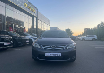 Подержанный автомобиль Toyota Corolla Sedan 2012 года (2 фото)