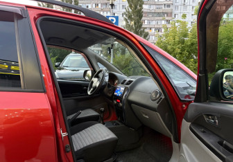 Подержанный автомобиль Suzuki SX4 Hatchback 2010 года (10 фото)