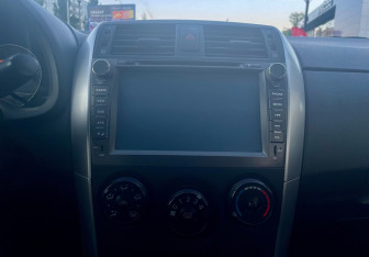 Подержанный автомобиль Toyota Corolla Sedan 2012 года (13 фото)