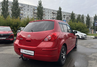 Подержанный автомобиль Nissan Tiida Hatchback 2012 года (5 фото)