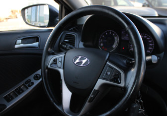 Подержанный автомобиль Hyundai Solaris Sedan 2014 года (13 фото)