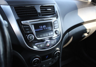 Подержанный автомобиль Hyundai Solaris Sedan 2014 года (11 фото)