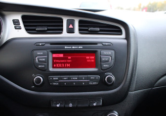 Подержанный автомобиль Kia Ceed Hatchback 2014 года (14 фото)