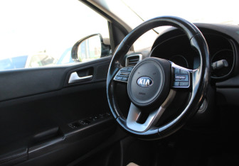 Подержанный автомобиль Kia Sportage 2018 года (13 фото)