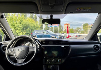 Подержанный автомобиль Toyota Corolla Sedan 2018 года (11 фото)