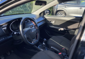 Подержанный автомобиль Kia Rio Sedan 2017 года (9 фото)