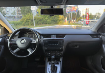 Подержанный автомобиль Skoda Octavia Liftback 2013 года (11 фото)