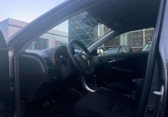 Подержанный автомобиль Toyota Corolla Sedan 2012 года (9 фото)